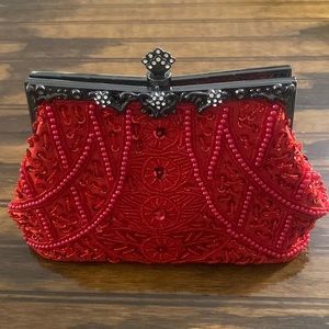 Red purse with sequins and rhinestones